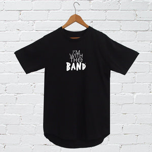 I'm With The Band® logo T-shirt with white print on black T on a coat hanger against a white painted brick wall