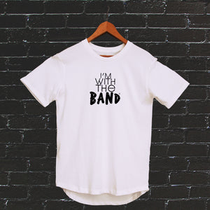 I'm With The Band® logo T-shirt with black print on white T on a coat hanger against a black painted brick wall