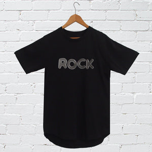 I'm With The Band® Bubble Rock T-shirt with white print on black T on a coat hanger against a white painted brick wall