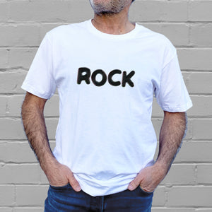 I'm With The Band® Bubble Rock T-shirt with black print on white T being worn by a faceless man standing against a white painted brick wall