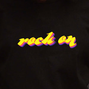 I'm With The Band® Rock On T-shirt with bright colour print on black T extreme close-up showing the graphic detail